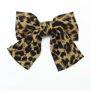 Barrette à cheveux avec grand nœud motif léopard et pince à ressort en velours
