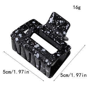 Black square hair claw clip with white splash patterns for elegant ponytails