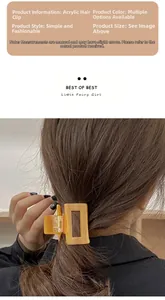 Macro view of geometric hollow square amber hair claw clip worn on a high ponytail style