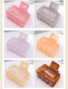 Detailed view of square hollow hair claws in six matte frosted colors for updos
