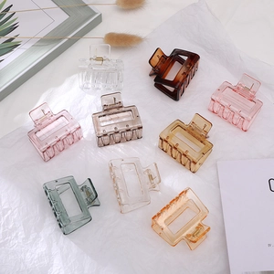 Hollow rectangular hair claws in various colors displayed on a white textured background
