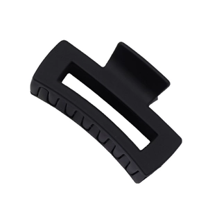 Minimalist matte black rectangular hair claw clip for women in a professional studio shot