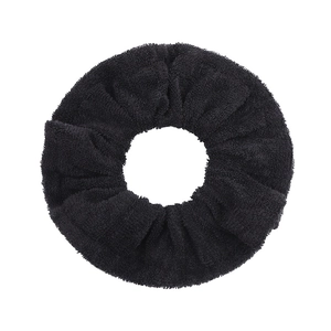 Solid black terry cloth scrunchie with soft ruffled texture for hair styling