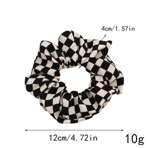 Detailed view of checkered scrunchie dimensions 12cm diameter and 4cm width