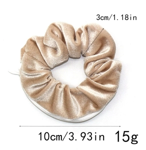 Detail view of champagne velvet zipper scrunchie with hidden pocket and white zipper