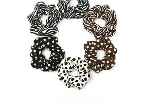 Set of 6 fabric scrunchies with elegant zebra stripes and polka dot patterns on white