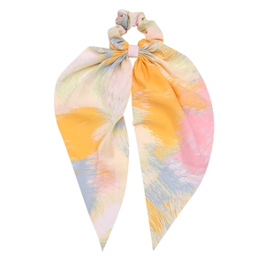 Bohemian floral print scrunchie with colorful long ribbons and abstract art patterns