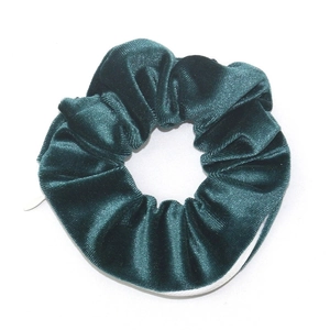 Dark green velvet scrunchie with hidden zipper pocket for small item storage