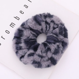 Faux rabbit fur scrunchie in grey leopard print for stylish hair styling