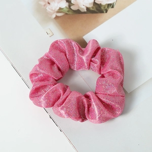 Sparkly pink fabric scrunchie with silver glitter sequins and elastic stretch design
