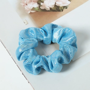 Sparkling sky blue fabric scrunchie with metallic glitter finish and elastic band