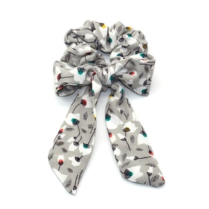 Elegant grey floral print scrunchie with long bow ribbons and soft twill texture fabric