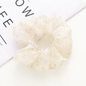 Chouchou élégant en organza champagne avec paillettes argentées pour queues de cheval
