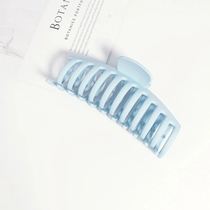 Detail of 14cm large light blue matte hair claw clip for thick hair styling