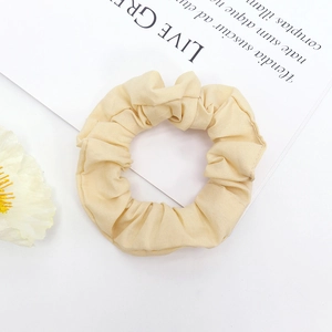 Chouchou en lin de coton beige minimaliste avec une texture plissée douce pour femme