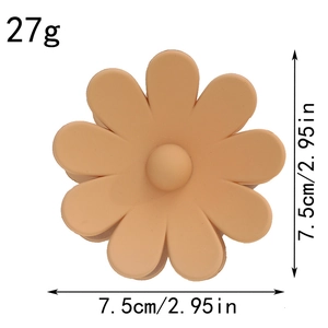 Vue détaillée de la pince à cheveux fleur orange mat, taille 7,5 cm et poids 27 g