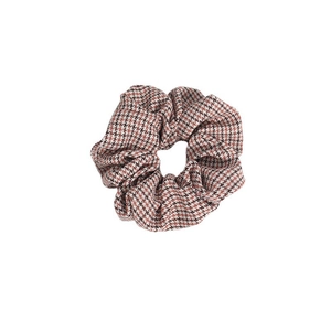 Elegant houndstooth pattern scrunchie in brown and white fabric for women hair styling