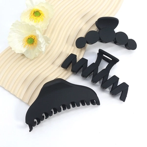 3-piece set of matte black hair claw clips in various minimalist geometric designs