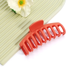 Grande pince à cheveux orange mat avec prise à dents multiples pour cheveux épais