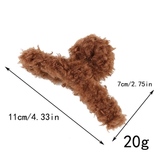 Detail showing 11cm large brown plush hair claw clip dimensions and weight specs