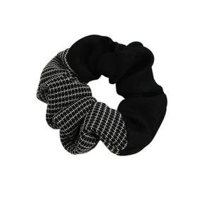 Elegant Korean style scrunchie with black ribbed knit and monochrome plaid fabric