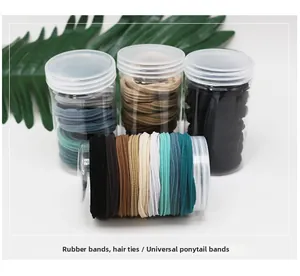 Macro shot of high-elasticity seamless hair bands set in three transparent storage jars