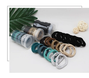 Macro detail of high elasticity hair bands set in assorted colors and storage jars