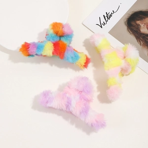 Three plush rainbow hair claws in colorful faux fur for women's autumn winter hairstyles