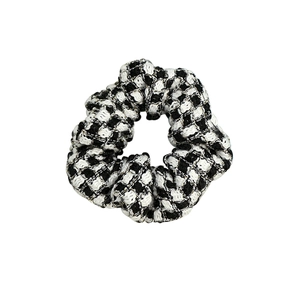Classic black and white checkered tweed scrunchie with subtle metallic gold threads