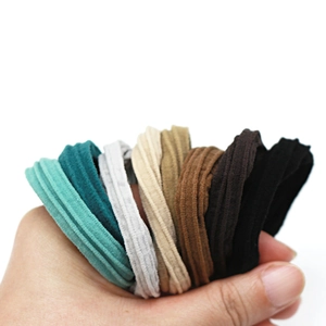 Multi-color seamless hair ties with ribbed texture in a neutral tone collection