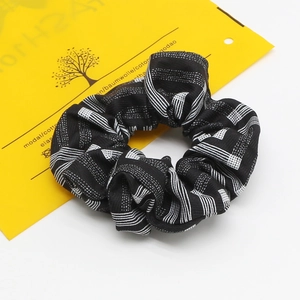 Chouchou élastique en coton modal avec motif à rayures géométriques noires et blanches