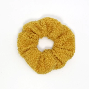 Fluffy yellow sherpa fleece scrunchie with high elasticity for elegant hair styling