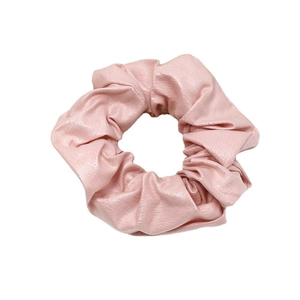 Elegant milk tea pink PU leather scrunchie with soft texture and minimalist aesthetic