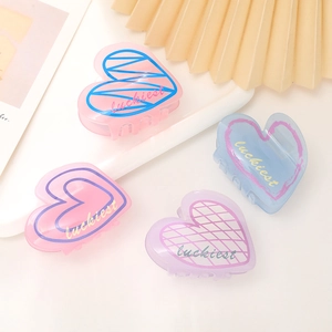 Pinces à cheveux macaron en forme de cœur rose et violet avec lettrage luckiest