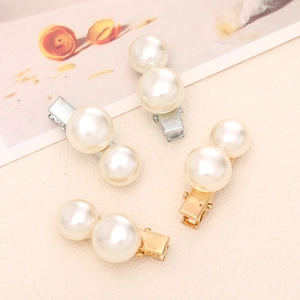 Elegant 4-piece pearl hair clip set with gold and silver metal bases for women