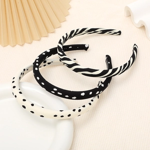 Three-piece zebra and polka dot sponge headbands in a stylish retro fabric design