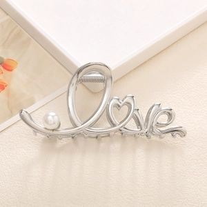Silver metal LOVE hair claw clip with heart shape O and pearl accent for women