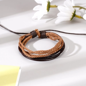Multilayer braided leather bracelet with evil eye charm in vintage brown design
