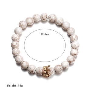 Natural white turquoise beaded bracelet with golden crown charm and marble patterns