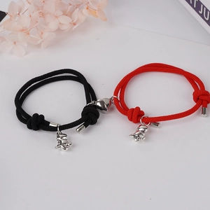 Bracelets de couple avec cœur magnétique et pendentif dinosaure mignon en rouge et noir