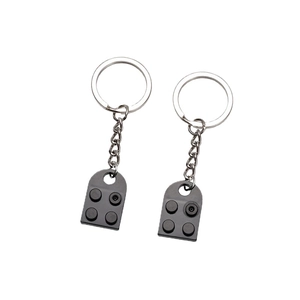 Matching heart block keychain set for couples in black finish with silver rings