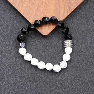 Bracelet en perles de cristal œil de tigre à facettes avec détails en acier inoxydable