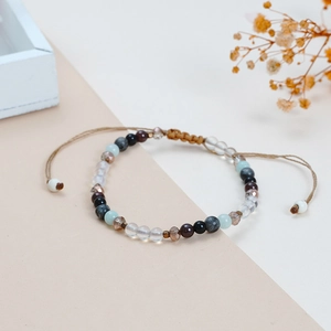 Handmade woven natural stone bead bracelet with adjustable cord in bohemian style