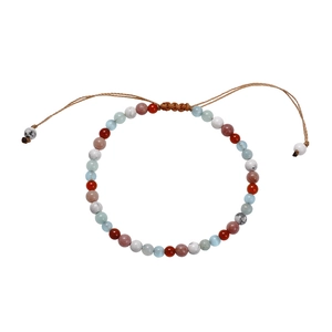 Handmade bohemian natural stone beaded bracelet with adjustable braided cord on white background