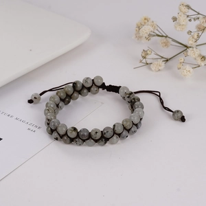 Double-layer natural stone beaded bracelet with adjustable woven cord and grey mineral texture
