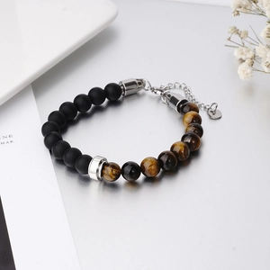 Tiger eye and matte black beaded bracelet with stainless steel accents and chain