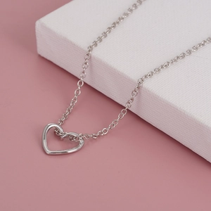 Collier élégant avec pendentif cœur ajouré en argent et chaîne maille jante