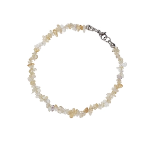 Collar minimalista de piedras de cuarzo amarillas irregulares con cierre de langosta plateado