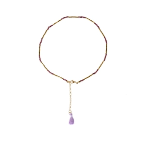 Long stainless steel tassel necklace featuring red beads and elegant purple silk fringe