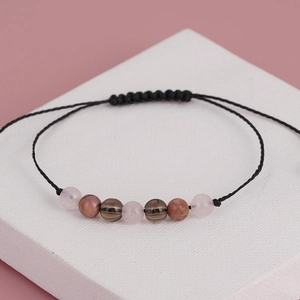 Handmade woven yoga bracelet with seven natural crystal beads and adjustable black cord
